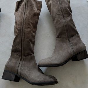 Tall taupe colored boots